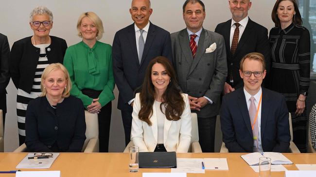 The Princess of Wales poses with Deloitte's Global Lead Executive Insight and Experience including Peter Flavel. Picture: AFP