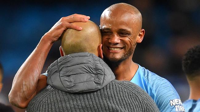 Vincent Kompany and Josep Guardiola celebrate Manchester City’s win. Picture: Getty Images