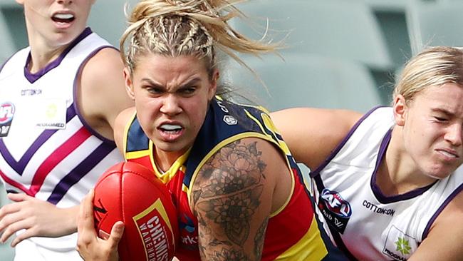 ADELAIDE, AUSTRALIA - APRIL 01: Anne Hatchard of the Crows is tackled by Dana East of the Dockers during the 2022 AFL Round 03 match between the Adelaide Crows and the Port Adelaide Power at Adelaide Oval on April 01, 2022 In Adelaide, Australia. (Photo by Sarah Reed/AFL Photos via Getty Images)