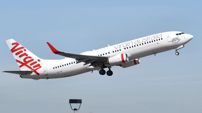 An airline and private equity firm are believed to have joined forces for a potential acquisition of Virgin Australia. Picture: AFP