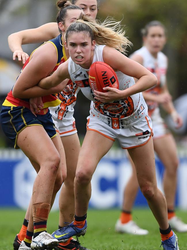 Madison Brazendale of the Giants is tackled by Ebony Marinoff of the Crows. Picture: Getty