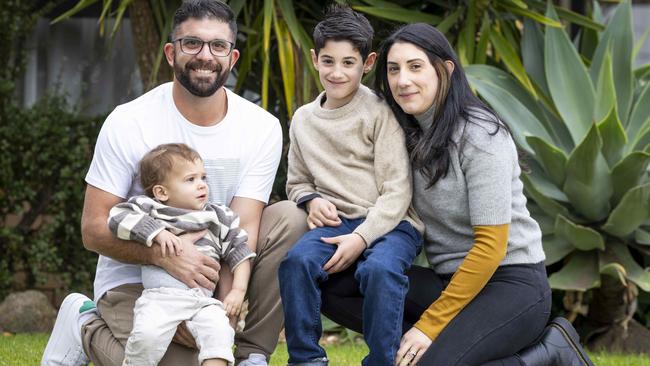 Noah Carpino with his parents Andrew and Deanna and his little brother Valentino. Noah was diagnosed with a rare genetic disease nicknamed childhood dementia. Picture: Wayne Taylor