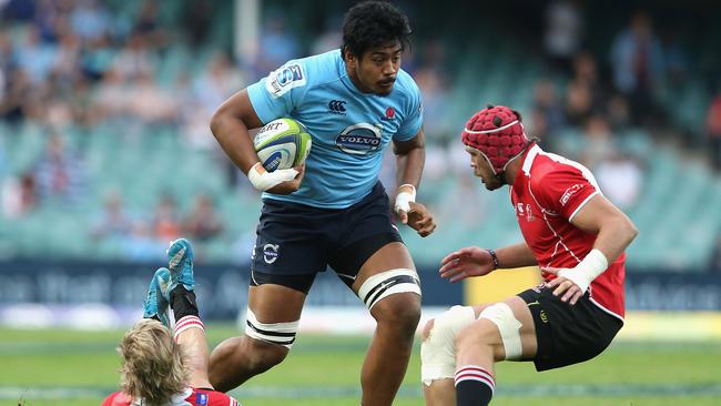 SYDNEY, AUSTRALIA - MAY 18: Will Skelton of the Waratahs is tackled during the round 14 Super Rugby match between the Waratahs and the Lions at Allianz Stadium on May 18, 2014 in Sydney, Australia. (Photo by Cameron Spencer/Getty Images)