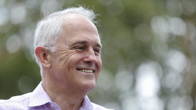 Australian Prime Minister Malcolm Turnbull reacts as newly elected Liberal member for Bennelong, John Alexander speaks to the media during a press conference at Parry Park in Putney, Sydney, Sunday, December 17, 2017. Mr Alexander claimed victory in the December 16 Bennelong By-Election over Labor candidate Kristina Keneally. (AAP Image/Paul Braven) NO ARCHIVING