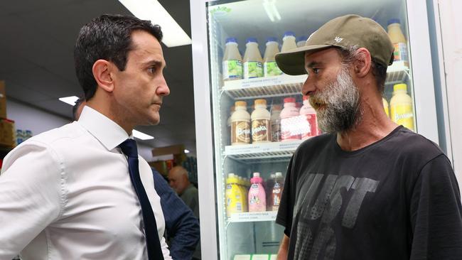 LNP leader David Crisafulli at the Everyday Foundation’s low-cost food outlet in Nambour, where a local criticised politicians for ‘empty promises’. Picture: Tertius Pickard