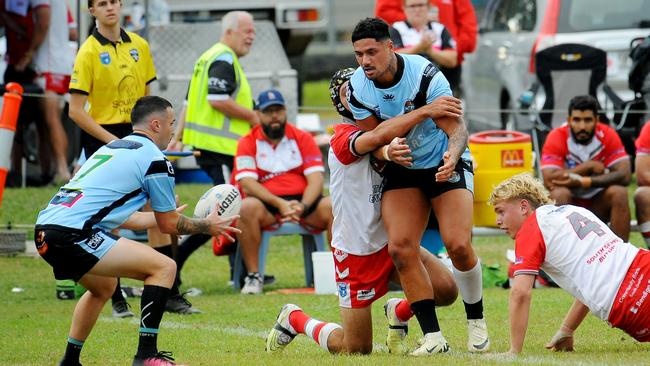 Woolgoolga's Shayde Perham offloading the ball to Tyler Murden. Picture: Leigh Jensen