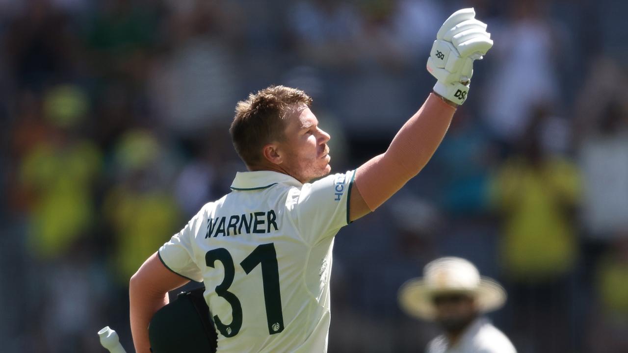 David Warner of Australia celebrates after scoring a century during day one of the Men's First Test match between Australia and Pakistan at Optus Stadium on December 14, 2023 in Perth, Australia. (Photo by Paul Kane/Getty Images)