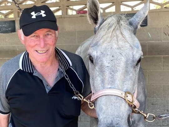 Trainer Jim O'Shea and his mate Barry, known on the racetracks around Queensland as Barachiel. Photo: Tony McMahon