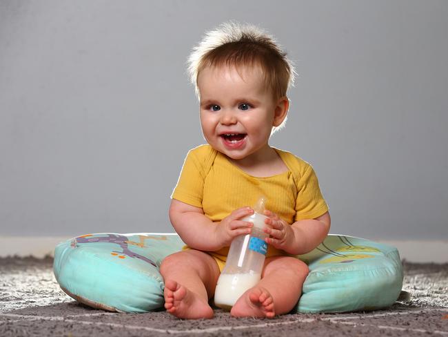 9 Month old Gold Coaster Max Thomson enjoys his a bottle .... To go with a story researchers coming up with new formula. Pics Adam Head