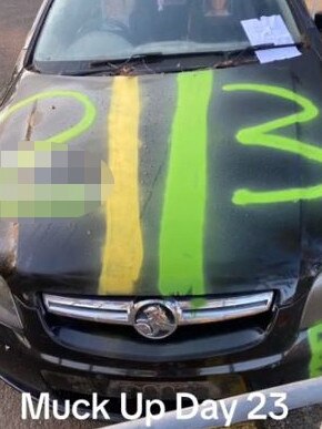 A spray-painted car at Epping Boys High.