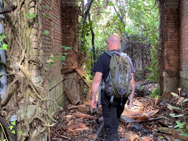 FINDERS BEEPERS HISTORY SEEKERS / CATERS NEWS (PICTURED: ANDY THOMPSON EXPLORING POVEGLIA ISLAND) Eerie footage captures inside the 'the world's most haunted island' - which is home to mass burial plague pits and an asylum. Poveglia Island, off the coast of Venice and Lido, Italy, is nicknamed the 'Island of Ghosts' due to its grizzly past, which first started when it was used as a quarantine station for people with the plague. People were dragged kicking and screaming to the island if they showed even the slightest symptoms of the Black Death, according to legend. The 18-acre plot was also used as a mass burial ground where some 160,000 victims are thought to have been burned to stop the spread of the disease. SEE CATERS COPY