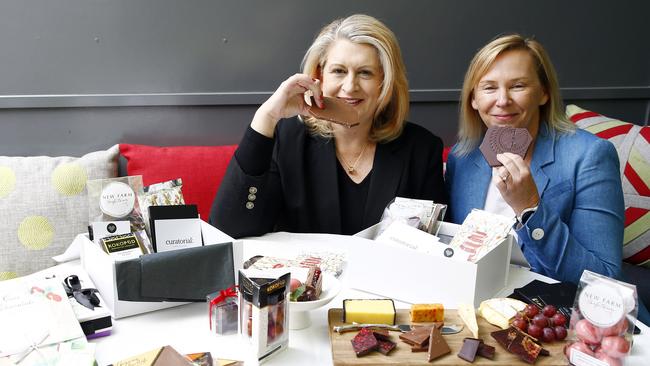 Bridget McDonald and Michelle Wade with their handmade chocolates.