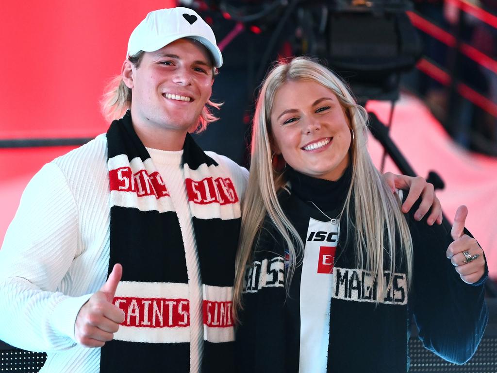 Jackson and Brooke Warne pose before doing the coin toss during the round one AFL match between the St Kilda Saints and the Collingwood Magpies at Marvel Stadium. Picture: Quinn Rooney/Getty Images