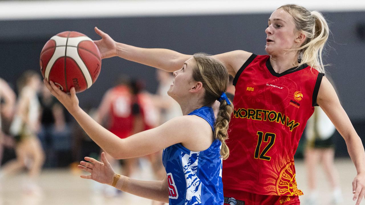 Samantha Hunter (left) of Toowoomba Mountaineers and Jessa Lowe-Barnsdale of Moreton Bay Suns in SQJBC U18 Women round 3 basketball at Toowoomba Grammar School, Sunday, October 20, 2024. Picture: Kevin Farmer