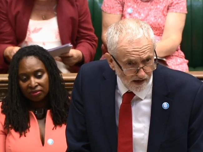 A video grab from footage broadcast by the UK Parliament's Parliamentary Recording Unit (PRU) shows Britain's opposition Labour Party leader Jeremy Corbyn speaking during Prime Minister's Questions (PMQs) in the House of Commons in London on July 18, 2018. / AFP PHOTO / PRU / HO / RESTRICTED TO EDITORIAL USE - MANDATORY CREDIT " AFP PHOTO / PRU " - NO USE FOR ENTERTAINMENT, SATIRICAL, MARKETING OR ADVERTISING CAMPAIGNS