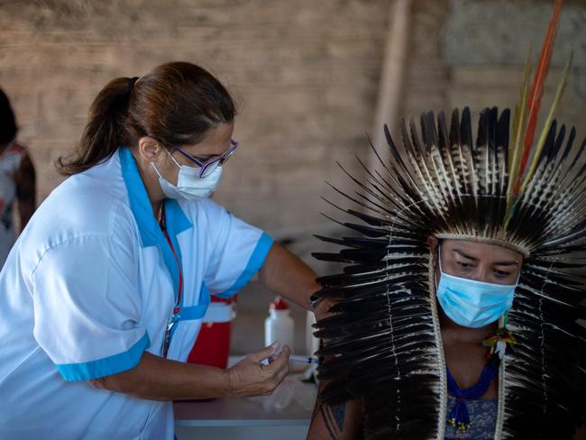 An Indigenous Brazilian person is inoculated with the Sinovac Biotech's CoronaVac vaccine against COVID-19. Picture: AFP