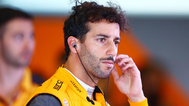 ABU DHABI, UNITED ARAB EMIRATES - NOVEMBER 19: Daniel Ricciardo of Australia and McLaren prepares to drive in the garage during final practice ahead of the F1 Grand Prix of Abu Dhabi at Yas Marina Circuit on November 19, 2022 in Abu Dhabi, United Arab Emirates. (Photo by Mark Thompson/Getty Images)