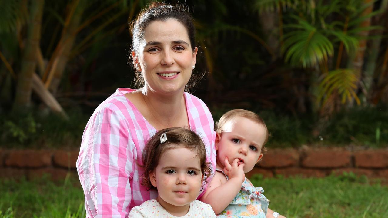 Pregnant mum Caroline McAlpine, 32, with Josephine 2, and Thea, 1, at home in Tarragindi. Picture: Liam Kidston.