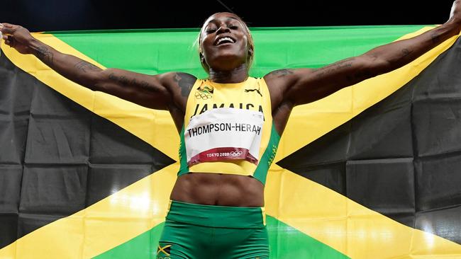 Jamaica's Elaine Thompson-Herah celebrates after winning the women's 100m final. Picture: AFP