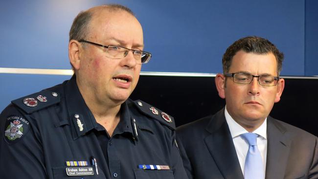 Chief Commissioner Graham Ashton and Premier Daniel Andrews address the public this morning. Picture: AAP