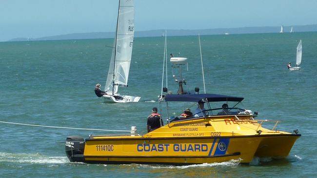 Brisbane Coast Guard volunteers tow a breakdown into Manly.