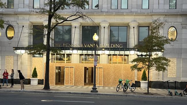 Boarded up windows on a building on Freedom Plaza in Washington. Picture: Keith Woods.