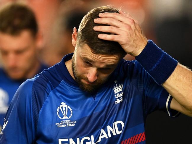 AHMEDABAD, INDIA - OCTOBER 05: Chris Woakes of England cuts a dejected figure following the ICC Men's Cricket World Cup India 2023 between England and New Zealand at Narendra Modi Stadium on October 05, 2023 in Ahmedabad, India. (Photo by Gareth Copley/Getty Images)