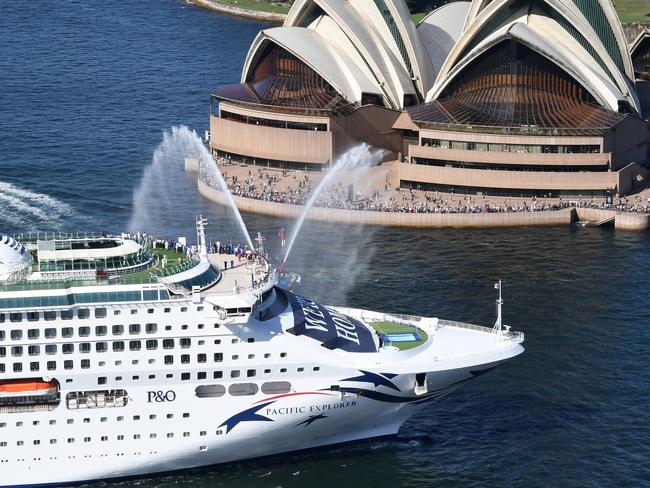 SYDNEY, AUSTRALIA - APRIL 18:  P&O Cruises Australia's flagship Pacific Explorer passes the Sydney Opera House as she enters Sydney Harbour on April 18, 2022 in Sydney, Australia. Pacific Explorer's arrival marks the return of cruising in Australia following a two-year hiatus following the coronavirus pandemic. (Photo by James D. Morgan/Getty Images for P&O Cruises)