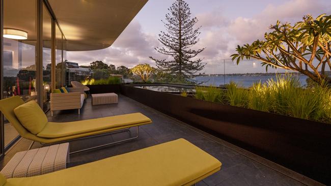 The house features views over the Swan River and beyond to the city.