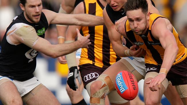 Jack Gunston and the Hawks are a step ahead of the Blues ... on the AFL ladder, at least. Picture: Getty Images