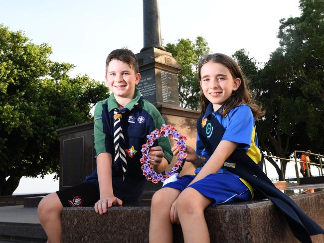 Remembrance Day , Parap Rainforest Guide member Stella Walsh 8 yrs and Berrimah Troop  scout Matthew Barber 11 yrs   prepare  for Remembrance Day at the Darwins Cenotaph war memorial on the Esplanade .  2020.  Picture Katrina Bridgeford.