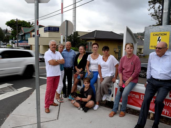 Parriwi Rd residents at the Spit and Parriwi roads intersection. The residents raised concerns about a left turn from a car park into Parriwi Rd, as it created a rat run.