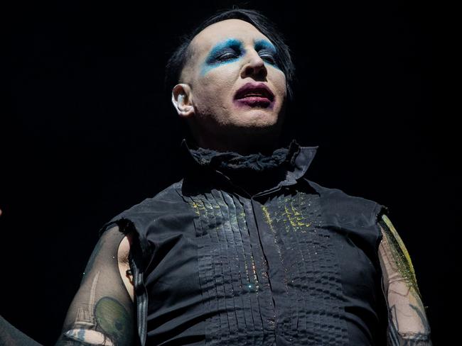 (FILES) In this file photo taken on November 08, 2019, Marilyn Manson performs during the Astroworld Festival at NRG Stadium in Houston, Texas - Los Angeles police are investigating domestic violence allegations against US goth rocker Marilyn Manson, the sheriff's department said on February 19, 2021. Confirmation of the probe comes after "Westworld" star Evan Rachel Wood this month accused Manson of years of abuse starting when she was a teenager. (Photo by SUZANNE CORDEIRO / AFP)