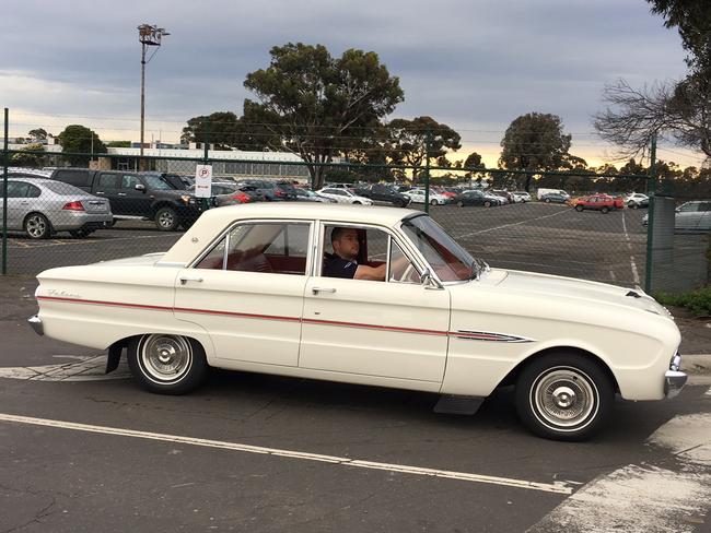 A 1963 Ford Falcon arrives at the Broadmeadows car factory to celebrate the last day of production. Picture: Joshua Dowling/News Corp Australia