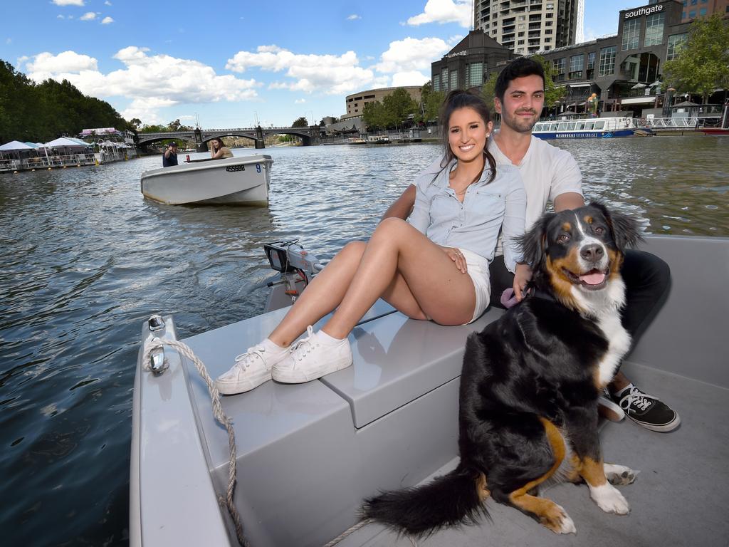 Elizabeth Spicer, Taylor and Gigi take a ride on a GoBoat on the Yarra River. Picture: Tony Gough