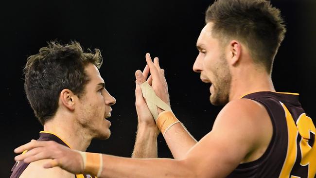 Isaac Smith and Jack Gunston celebrate a goal in Hawthorn’s win over Essendon. Photo by Quinn Rooney.