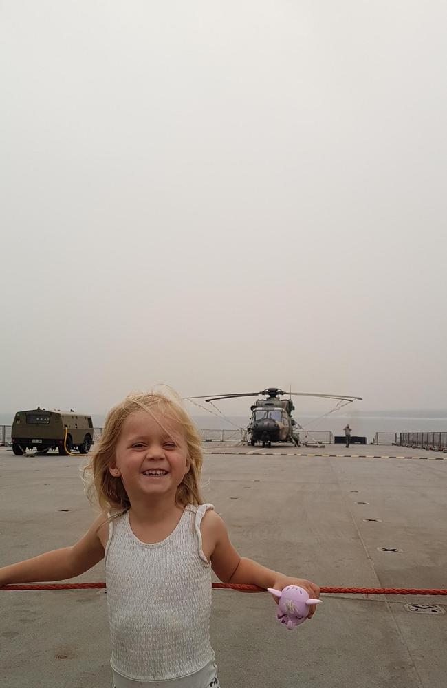 Mr Haigh’s daughter Poppy aboard the HMAS relief ship.