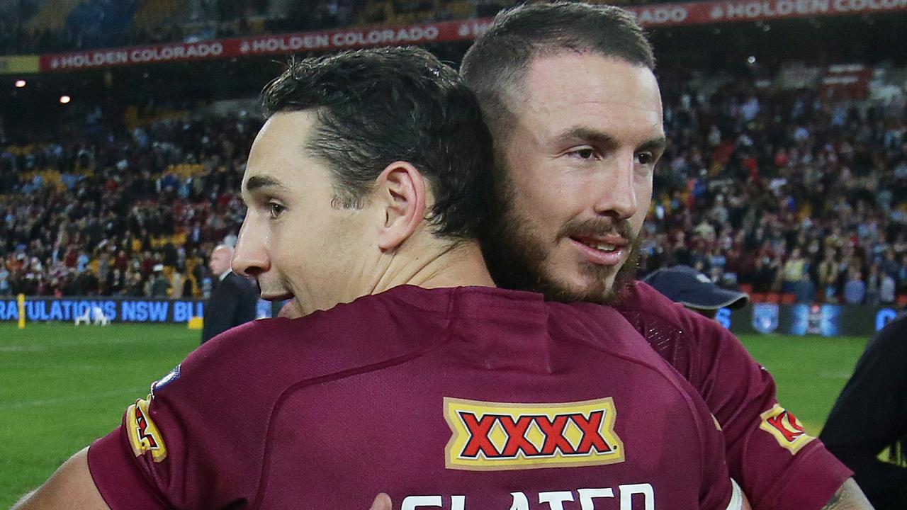 Billy Slater and Darius Boyd of Queensland embrace.