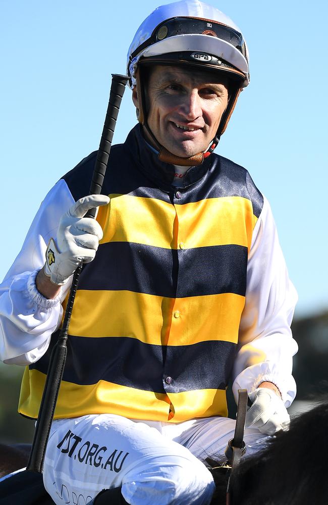 Bosson returns to the mounting yard after riding Quick Thinker to victory.