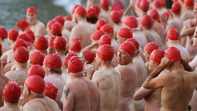 Participants prepare to hit the water for the nude solstice swim to mark the end of Dark Mofo. Picture: SAM ROSEWARNE