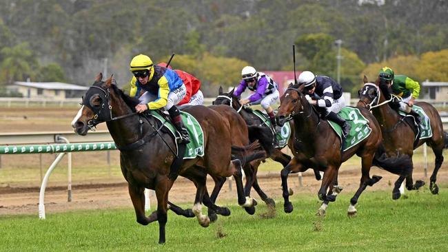 LEADING RUN: Jockey Jim Byrne guides Baby Boomer home at Ipswich racetrack. Picture: Cordell Richardson