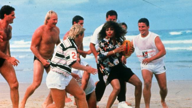 Tina Turner and NRL players in 1993. Picture: Action photographics/NRL Images.