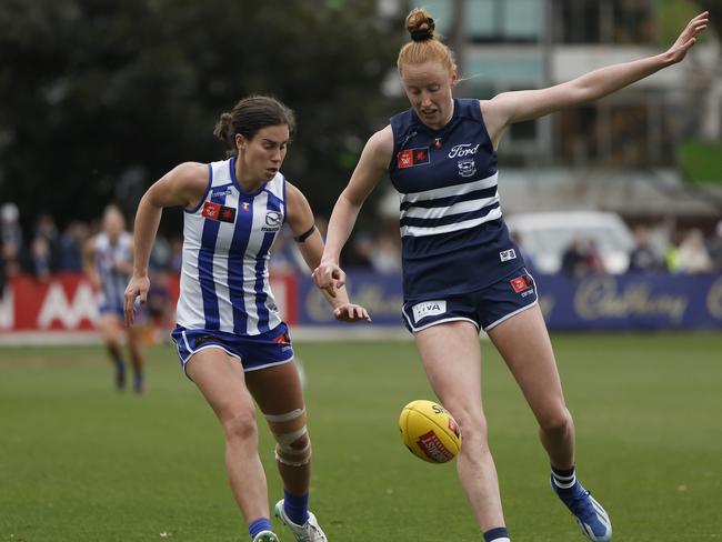 Aishling Moloney of the Cats and Libby Birch of the Kangaroos contest the ball. Picture: Getty Images