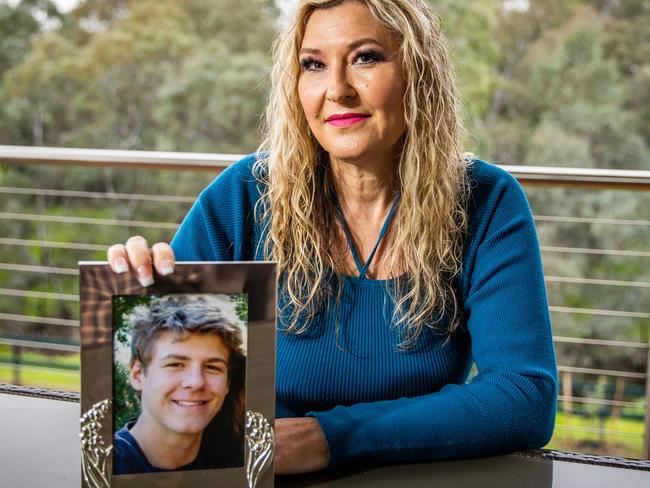 Sharlene Lynch with a photo of her son Scott, a teen who took his own life in 2011, pictured on August 12th, 2022, at her Windsor Garden home.Picture: Tom Huntley