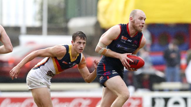 Dean Terlich (right) during his SANFL playing career. Picture: Sarah Reed