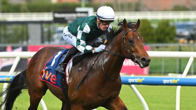 Growing Empire sprints away from his rivals in the McNeil Stakes at Caulfield on Saturday. Picture: Vince Caligiuri/Getty Images