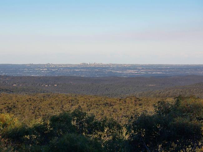 No. 102 Tableland Rd, Wentworth Falls, has Sydney skyline views.