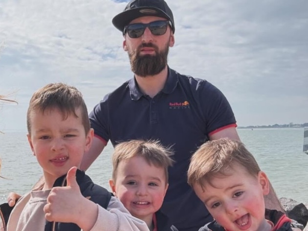 The deaths of three children whose bodies were found alongside their father’s at a house in Surrey in the UK are being investigated as murder, police have said