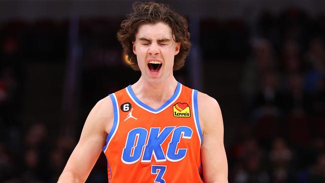 *** BESTPIX *** CHICAGO, ILLINOIS - JANUARY 13: Josh Giddey #3 of the Oklahoma City Thunder celebrates a basket by Kenrich Williams #34 (not pictured) against the Chicago Bulls during the second half at United Center on January 13, 2023 in Chicago, Illinois. NOTE TO USER: User expressly acknowledges and agrees that, by downloading and or using this photograph, User is consenting to the terms and conditions of the Getty Images License Agreement. (Photo by Michael Reaves/Getty Images)