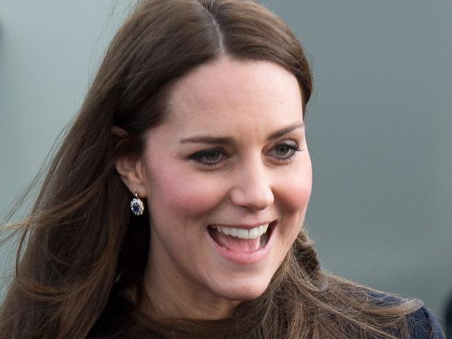 Catherine, Duchess of Cambridge, wearing a Madderson dress, officially opens The Clore Art Room at Barlby Primary School in London. (Photo by Zak Hussein/Corbis via Getty Images)